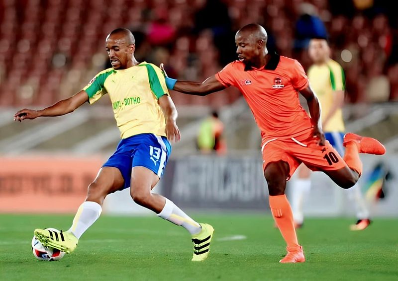 Tiyani Mabunda challenging for the ball for Mamelodi Sundowns