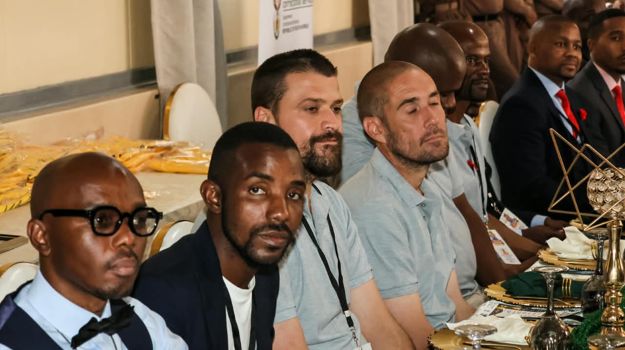 Guests seated at a banquet table at the Funda Mzansi event